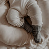 Grijze wollen sok voor baby's van het merk Joha.